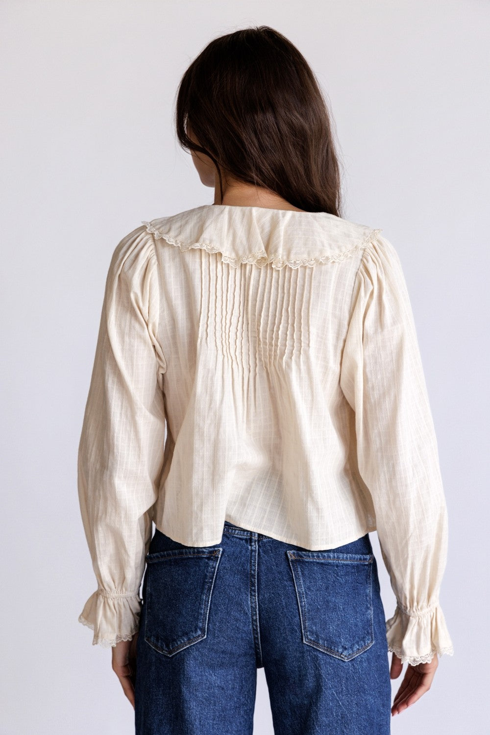 Adhara Cream Ruffle V-Neck Blouse