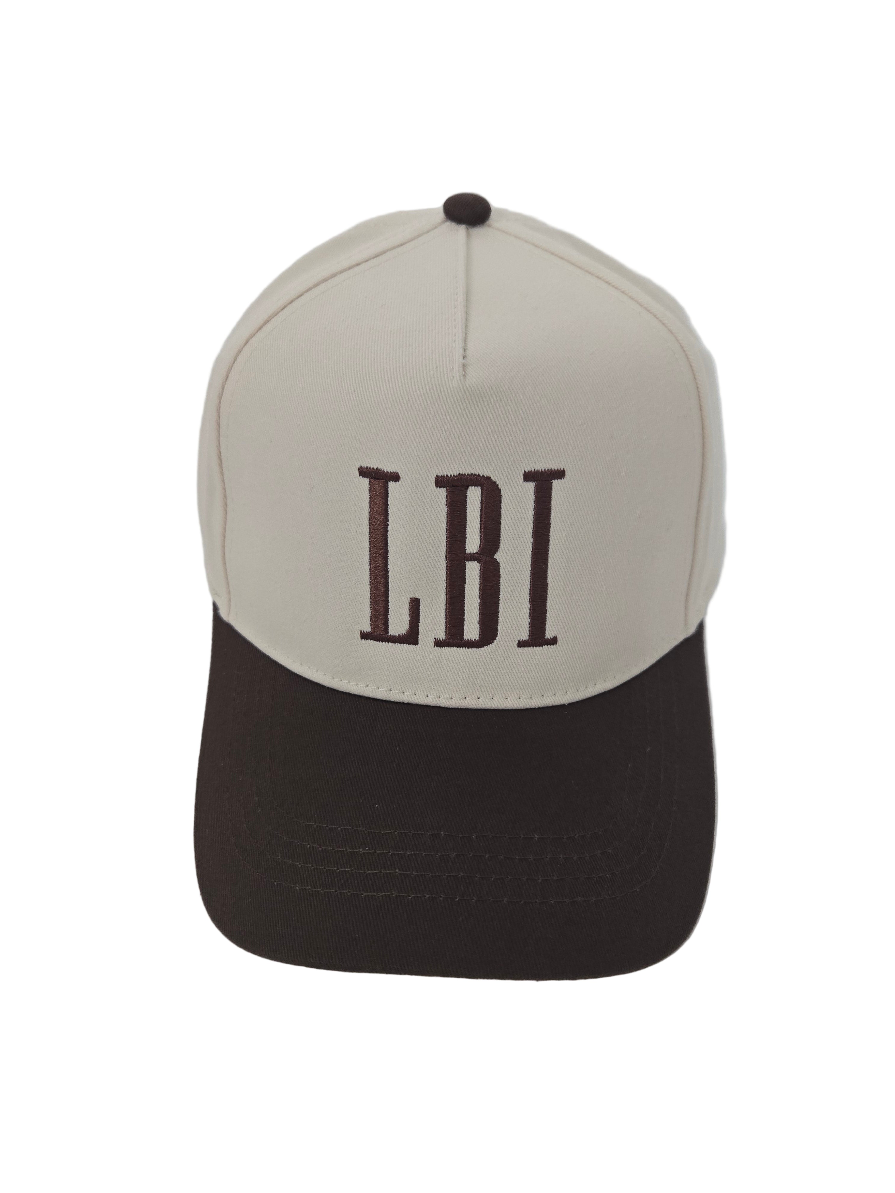 Two-tone cap with 'LBI' logo on a white background